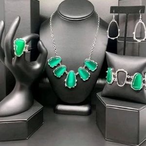 Set necklace, earrings, ring, bracelet.